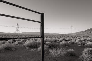 Interpretive sign frame without the interpretive placard, and power lines, Owens Lake