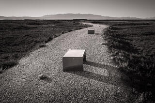 Wildlife viewing benches on stone path, Owens Lake