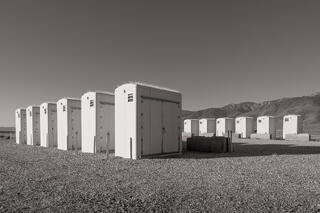 Two rows of white, pump houses, Owens Lake
