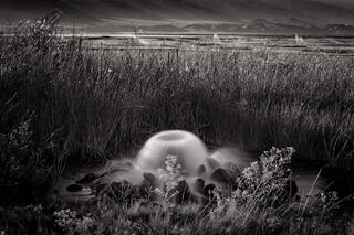 Giant bubbler and sprinklers flooding fields, Owens Lake